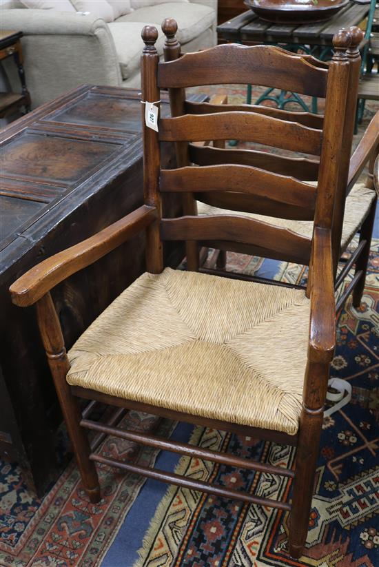 A set of eight ladderback rush seat oak dining chairs